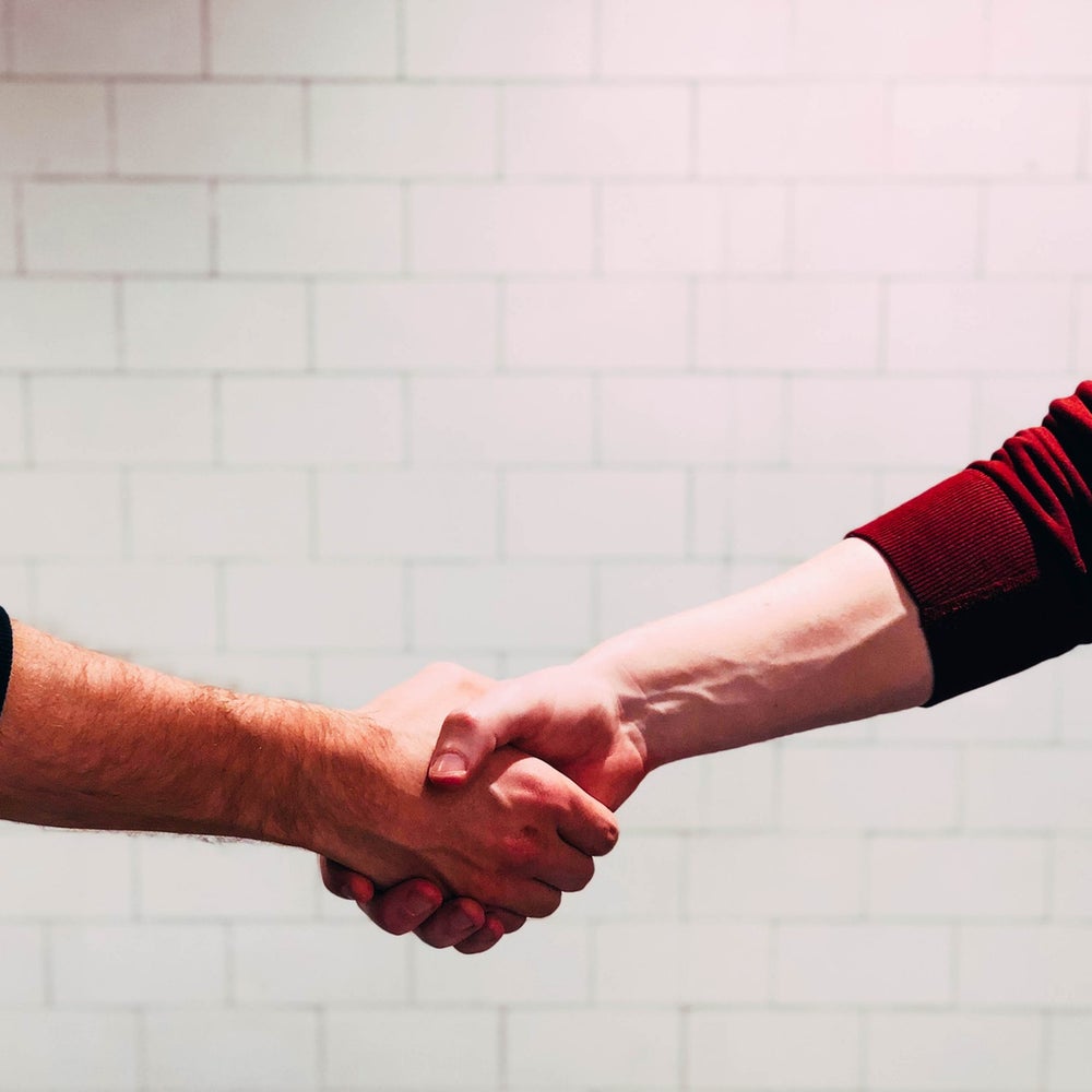 Handschlag als Bestätigung des vereinbarten Wiegetermins